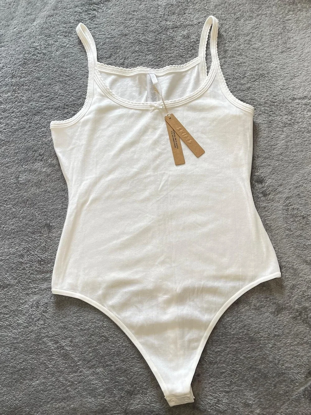 SKIMS Drop Needle Bodysuit L Snow White Ribbed Knit Lace Bodysuit NWT
